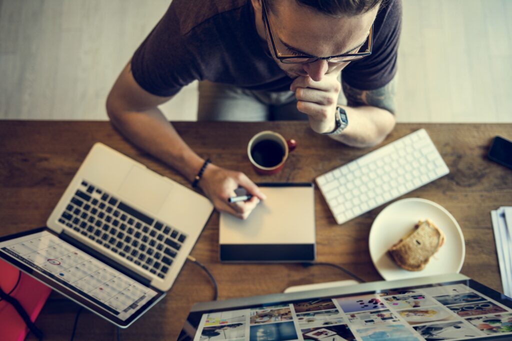 man busy photographer editing home office concept 2023 11 27 05 30 59 utc